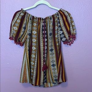 Red and gold tunic